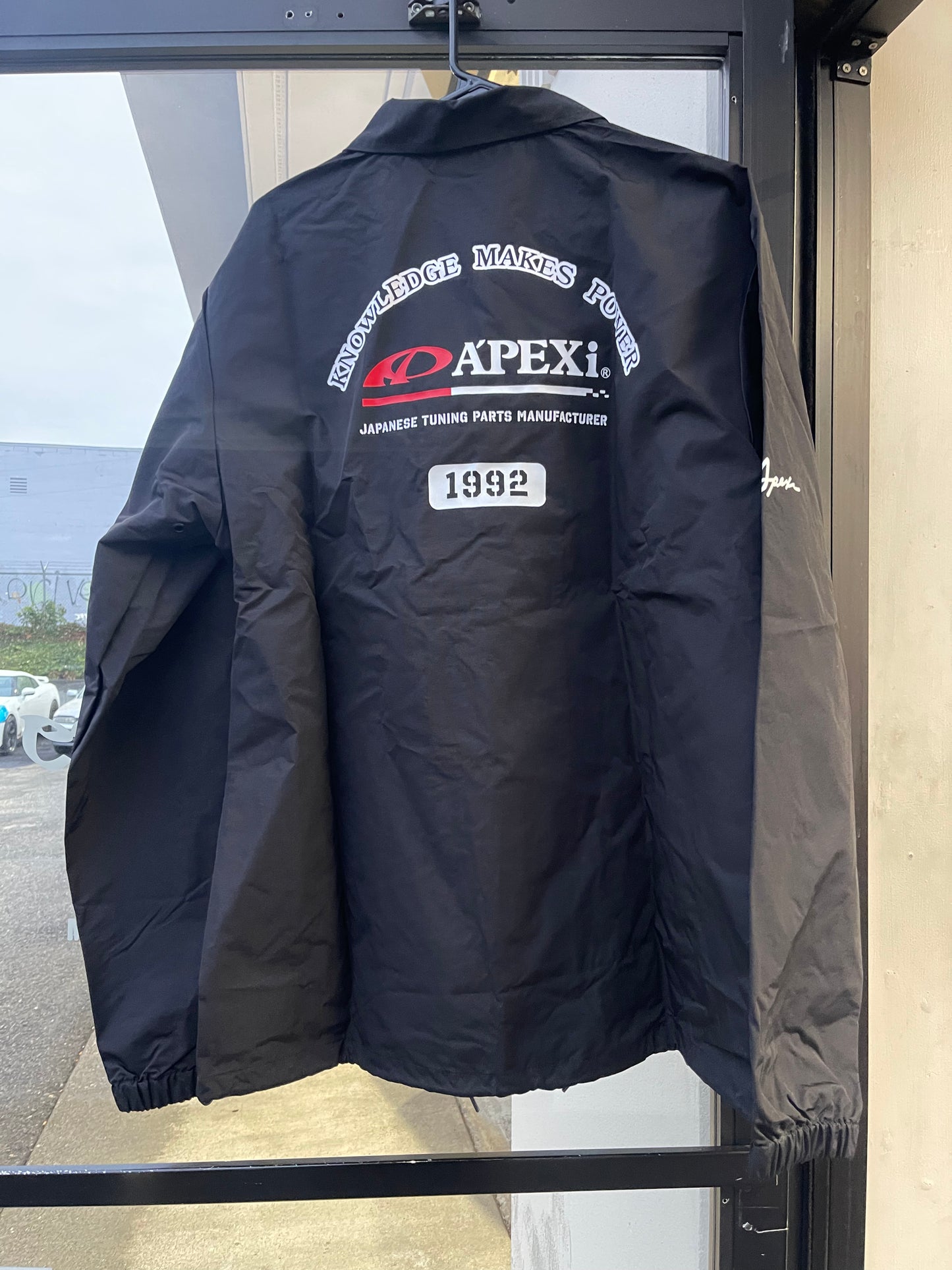 A'PEXi Knowledge Makes Power Windbreaker